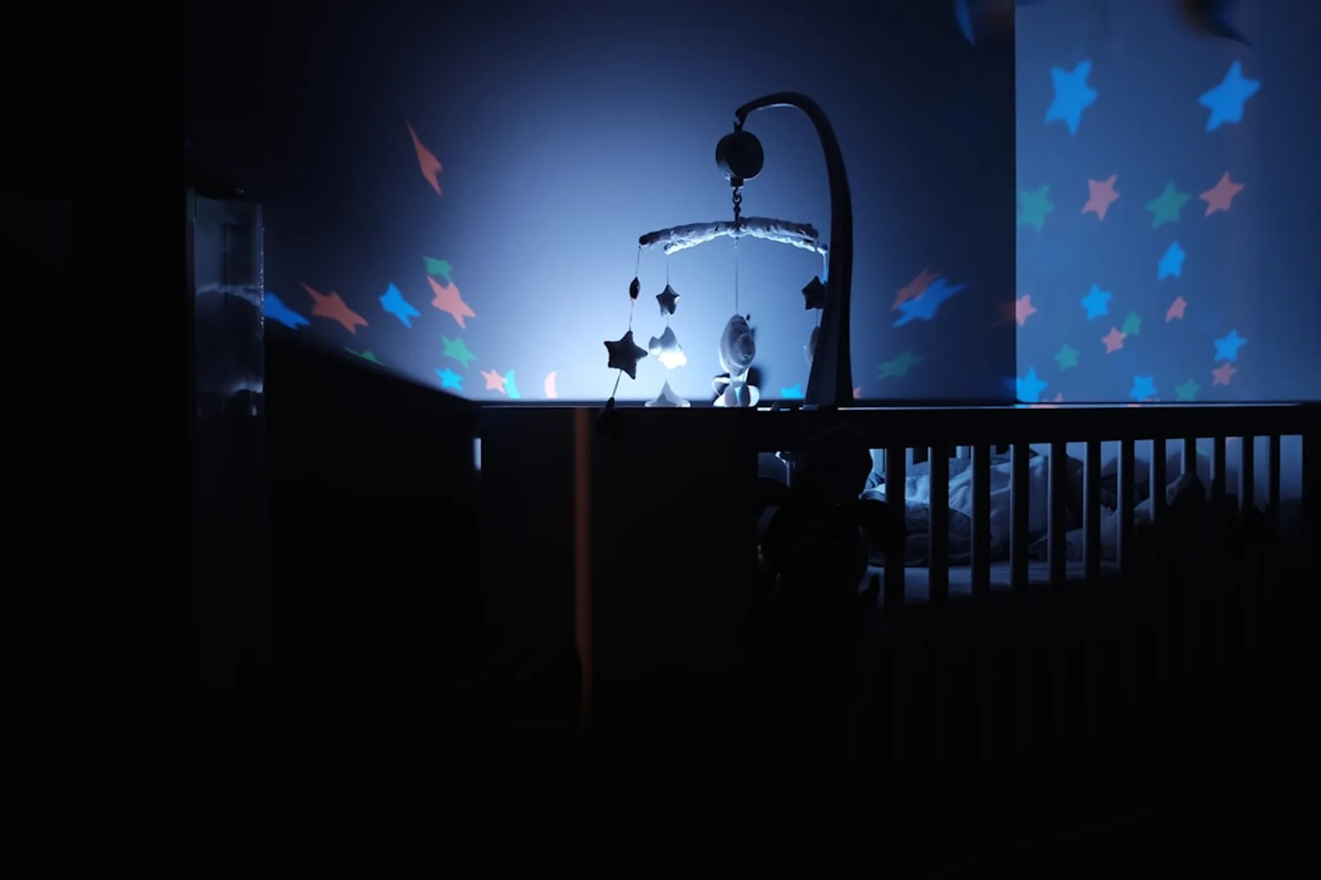 soft nightlight in a baby nursery with a speaker